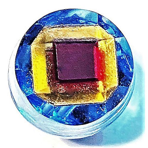 A DIVISION ONE CLEAR AND COLORED GLASS TINGUE BUTTON