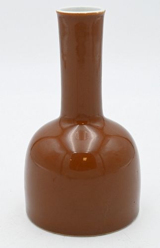 Chinese Brown Glazed Vase
coffee brown color having long neck
bottom signed with six character marks
height 7 1/2 inches