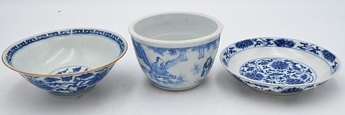 Three Piece Chinese Porcelain Group
to include a blue and white dish having painted lotus flowers, a blue and white bowl having wild flower, along wit