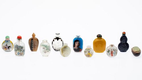 11 Chinese Snuff Bottles and a Carved Stone
