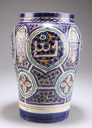A LARGE PERSIAN TIN-GLAZED EARTHENWARE VASE, 19TH CENTURY, of baluster form