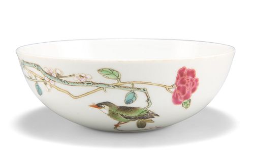 A CHINESE PORCELAIN BOWL, circular, enamel painted with a bird perched upon