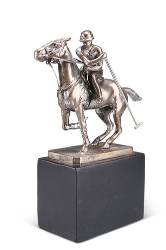 A CHROME PLATED FIGURE OF A POLO PLAYER ON HORSEBACK, on a textured rectang