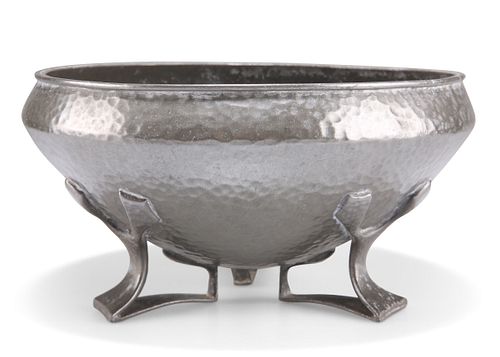OLIVER BAKER FOR LIBERTY & CO, A TUDRIC PEWTER FOOTED BOWL, of planished de