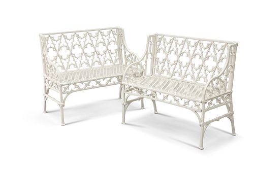 A PAIR OF WHITE PAINTED METAL "GOTHIC" GARDEN BENCHES, the backs with quatr