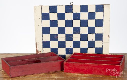 Painted gameboard, ca. 1930, 12 1/2'' x 16'', together with a pair of utensil trays, 7'' l., 11 1/4'' w.