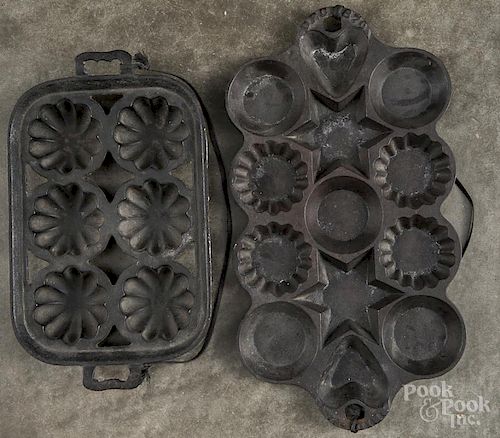Two cast iron muffin pans, late 19th c., 13 1/4'' l. and 16 3/4'' l.