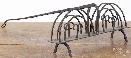 Wrought iron toaster, 19th c., 22 1/2'' h., 14 1/4'' w.