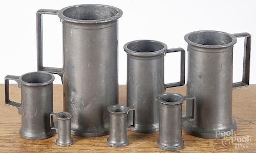 Seven graduated pewter measures, 19th c., tallest - 7''.