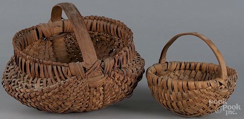 Two split oak baskets, late 19th c., 10 1/2'' h. and 7 1/2'' h.