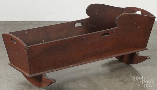 Pennsylvania red stained cherry cradle, 19th c., 19'' h., 46'' w.