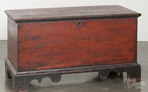 Diminutive painted pine blanket chest 19th c., retaining an old red and black surface, 20'' h.