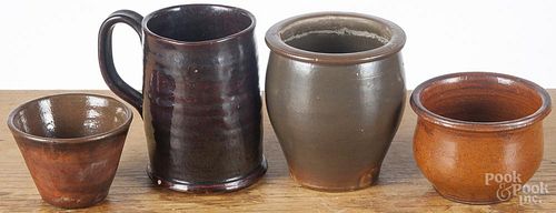 Three small redware crocks, 19th c., together with a mug, 4 3/4'' h.