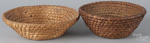 Two Pennsylvania rye straw baskets, 19th c., 3 1/2'' h., 12 1/2'' w. and 4 1/2'' h., 11 1/2'' w.