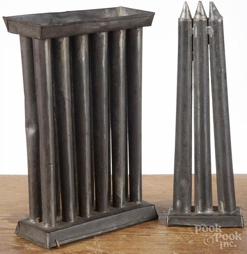 Two tin candlemolds, 19th c., 10 1/2'' h. and 11 1/4'' h.