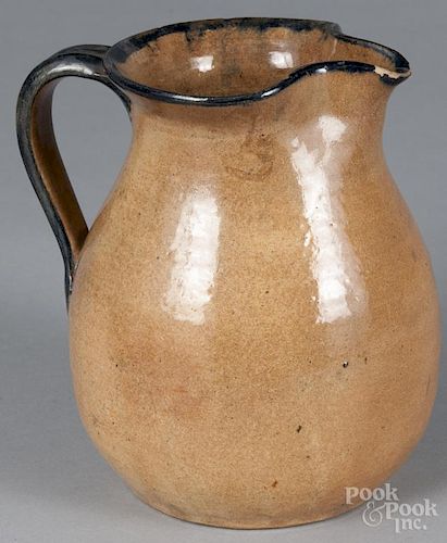 Buff clay pitcher, late 19th c., 7 3/4'' h.  Provenance: The Estate of Bernard B. Hillmann
