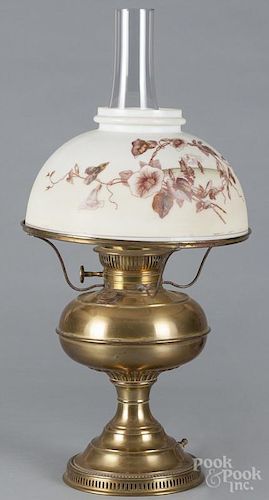 Two Brass Rayo lamps with a transfer decorated shade and an emerald shade, 21'' h.