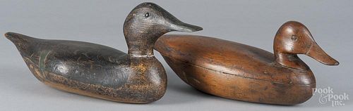 Two carved duck decoys, mid 20th c., 17'' l. and 15 1/4'' h.