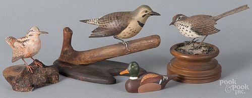 Four carved and painted birds, 20th c., to include examples signed R. C. Mitchell and V. W. Smith