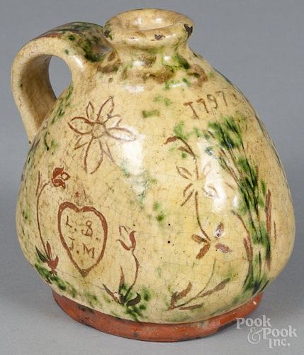 Sgrafitto decorated redware jug, spuriously dated 1797, 5 3/4'' h.
