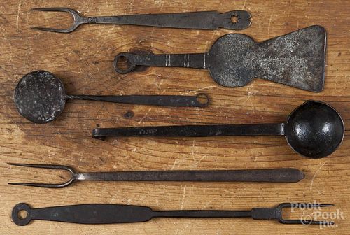 Six wrought iron utensils, to include a tasting ladle, stamped Boker, longest - 12 3/4''.