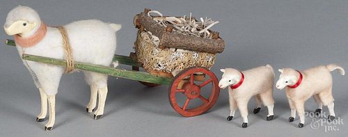 Contemporary stick leg sheep pull toy, 8 1/4'' l., together with two contemporary stick leg sheep