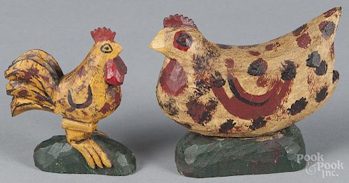 Daniel and Barbara Strawser, two carved and painted chickens, initialed and dated 70 on underside