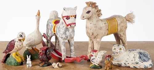 Russell Holtzman, ten carved and painted animals, signed or branded on underside, largest - 7 1/2'' h.