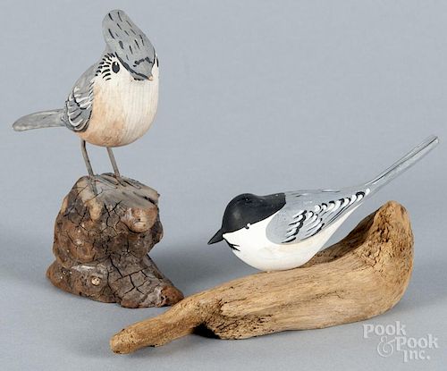 Robert Hogg, two carved birds, painted by C. X. Carlson, mounted on driftwood bases, signed