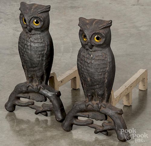 Pair of cast iron owl andirons, 19th c., with glass eyes, 14 1/2'' h.