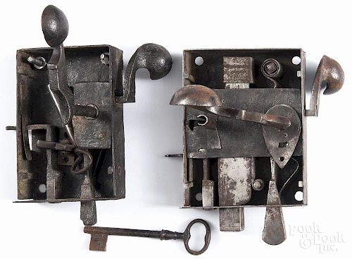 Two wrought iron door locks, early 19th c., with keys, 6 1/4'' w. and 5 3/4'' w.