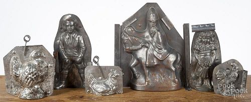 Six tin candy molds, early 20th c., tallest - 8 1/2''. Provenance: The Estate of Mark and Joan Eaby
