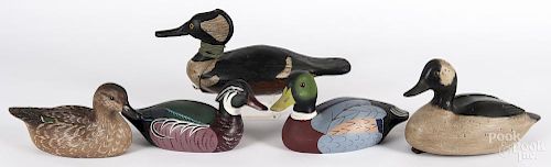 Five contemporary carved and painted duck decoys, one signed Bryant, one signed Bob Biddle