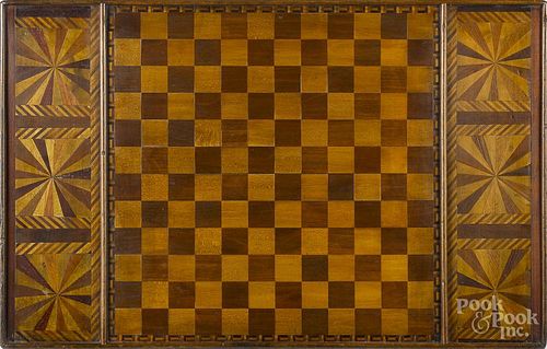Parquetry inlaid gameboard, late 19th c., 18 3/4'' x 30''.