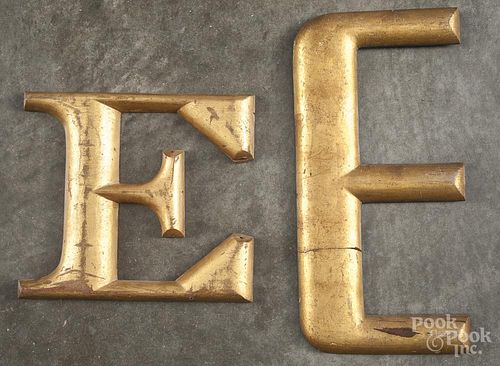 Two gilt store letters E, early/mid 20th c., 16'' h. and 9 3/4'' h.