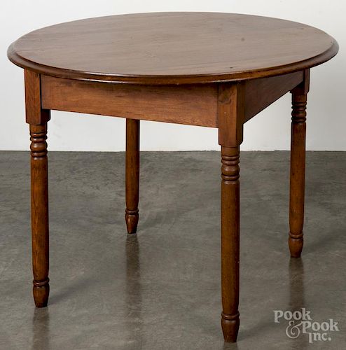 Country pine center table, early 20th c., 27'' h., 35 1/2'' w.