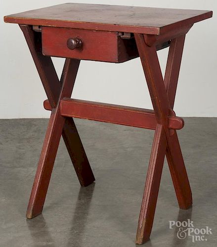 Painted pine and poplar sawbuck table, 19th c., retaining an old red surface, 29 1/4'' h., 24'' w.