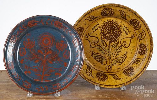 Two Foltz redware deep dishes, 12 1/2'' dia. and 13 1/2'' dia.