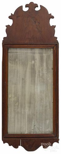 Pine looking glass, early 19th c., 27 3/4'' x 10 1/4''.  Provenance: The Estate of Bernard B. Hillmann