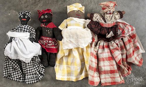 Black Americana fabric toaster covers, 20th c., and fabric dolls.
