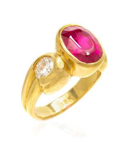 An 18 Karat Yellow Gold, Ruby and Diamond Ring, 6.10 dwts.