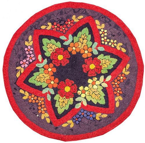 Four Hooked Rugs with Floral Motifs