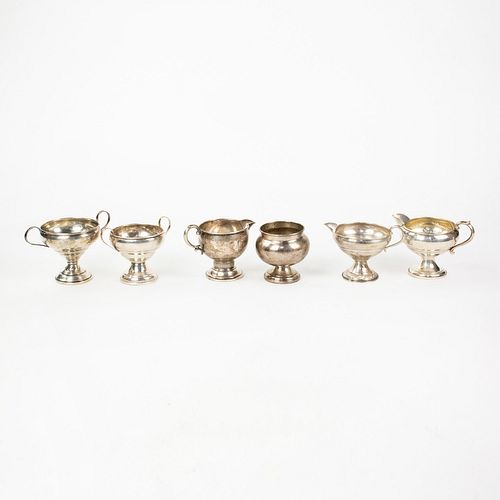 Grouping of Weighted Sterling Creamers and Sugar Bowls