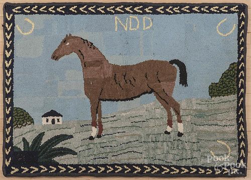 American hooked rug, mid 20th c., with a horse, 35'' x 49''.