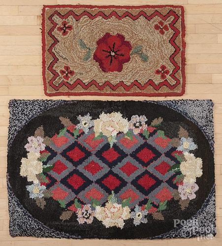 Two American floral hooked rugs, 34'' x 51'' and 23'' x 36''.