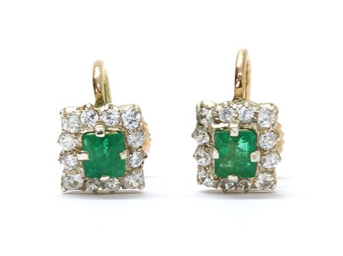 A pair of silver and gold emerald and white sapphire cluster earrings,