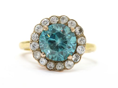 A gold blue zircon and white sapphire cluster ring,