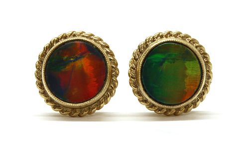 A pair of gold opal doublet stud earrings,