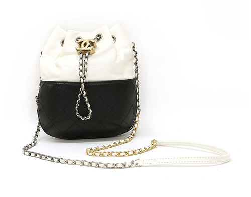 A Chanel Gabrielle two-tone black and white leather bucket bag,