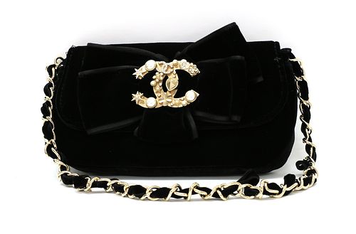 A Chanel black velvet evening bag,